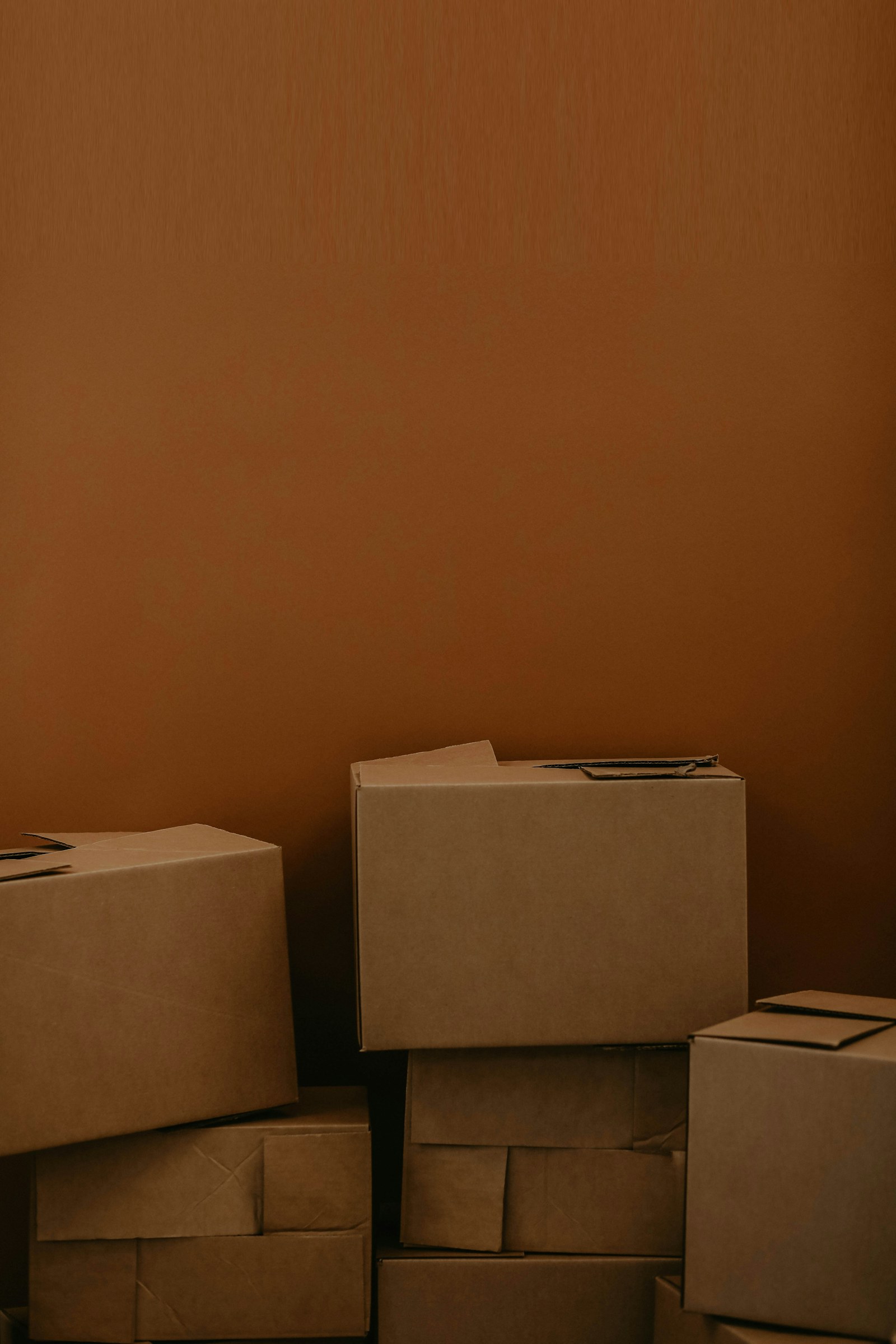 Neatly stacked moving boxes ready for the truck